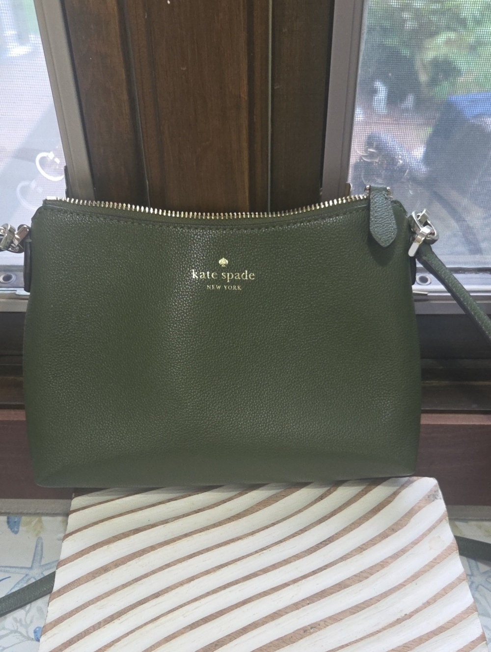 kate spade dark green pebbled leather crossbody with gold logo